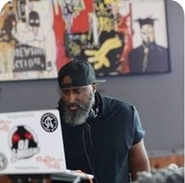 DJ J-Millie — owner and creator of Rhythm & Beats